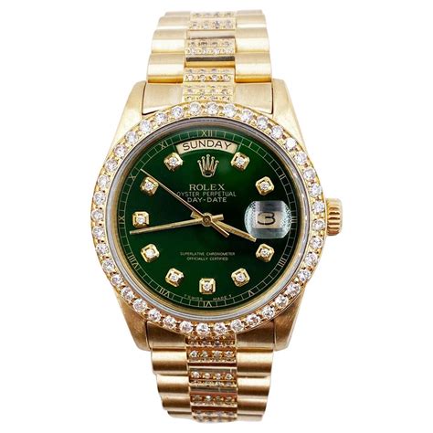rolex day date green dial diamond bezel